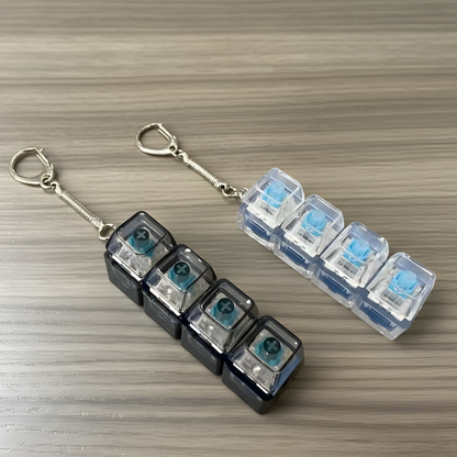Clixie Keystack fidget keychain with mechanical switches and LED glow for stress relief