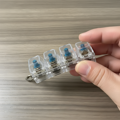 Clixie Keystack fidget keychain with mechanical switches and LED glow for stress relief